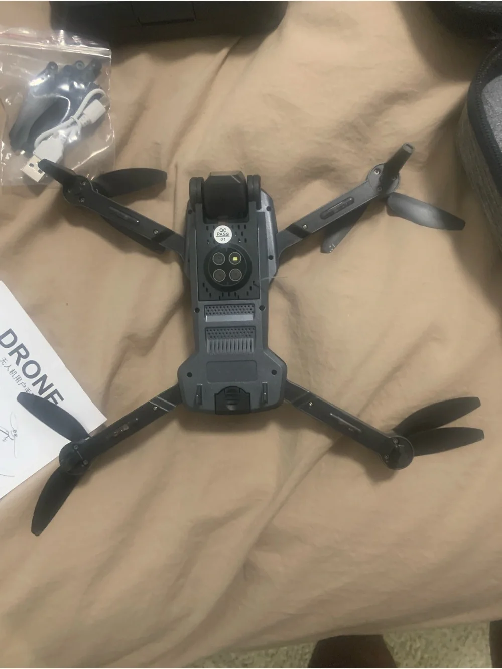 Black VR/Drone Controller with USB Cable and Spare Propellers